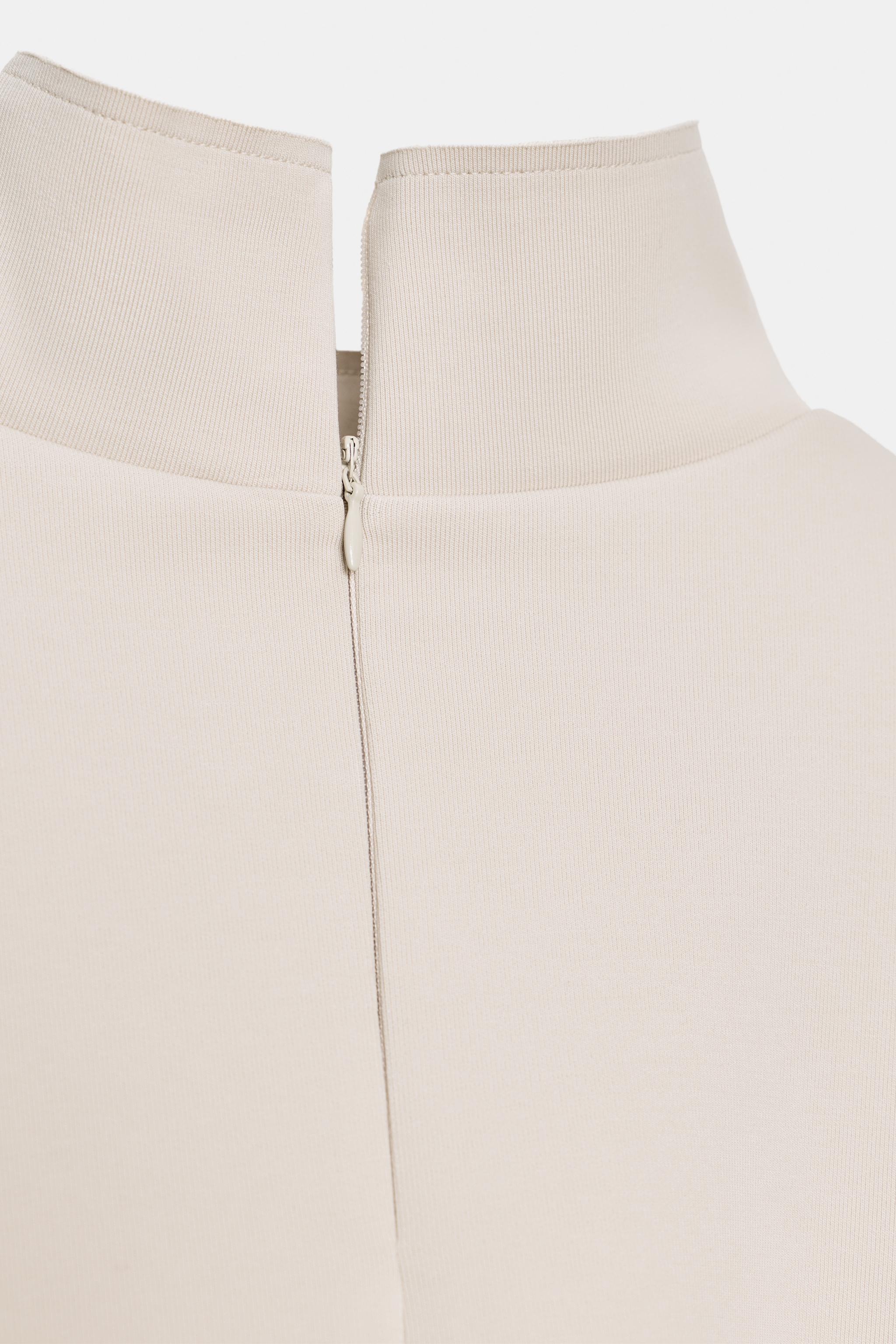 ASYMMETRIC INTERLOCK CAPE